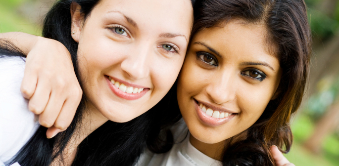 two female college students closeup portrait